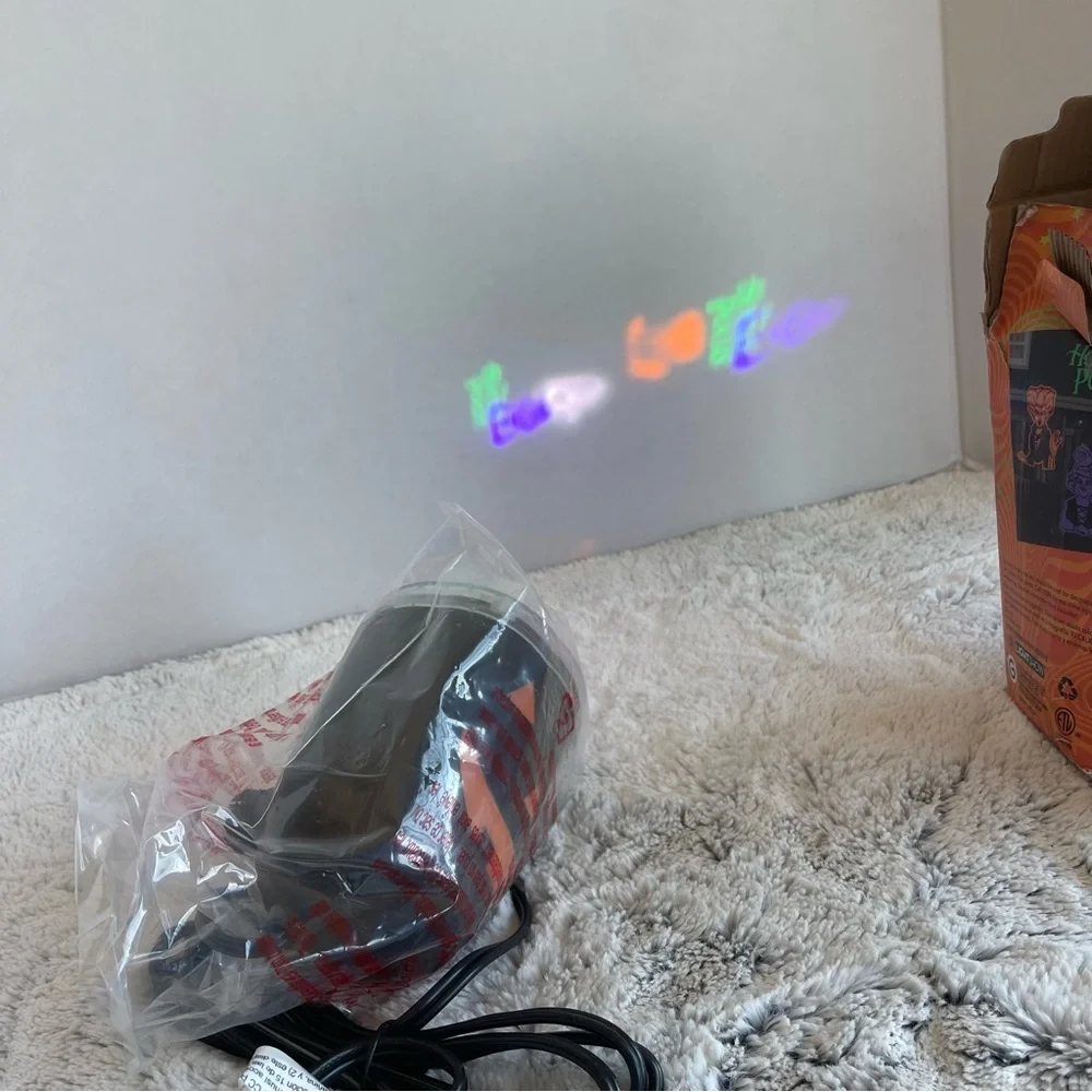 Disney Hocus Pocus LED Whirl-A-Motion Projection - Orange, Purple, Black, Green